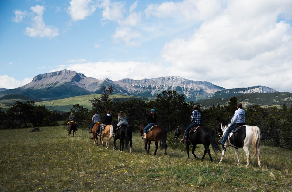 View of the rocky mountain front on horseback