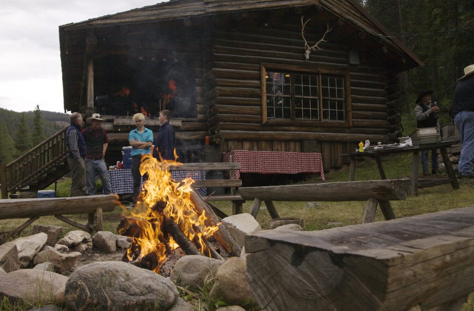 Warm up by the fire at Covered Wagon Ranch