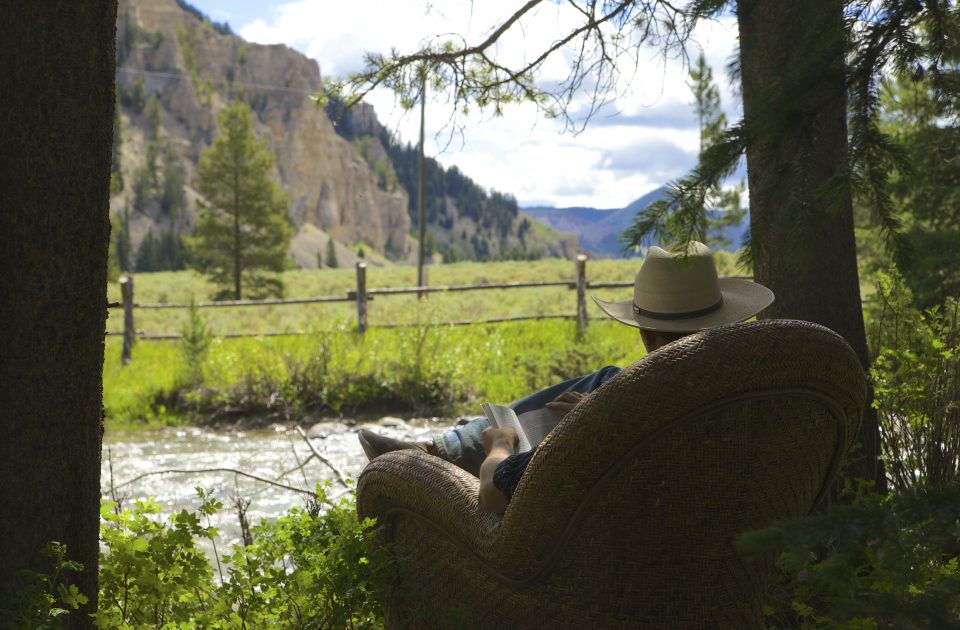 Nothing says peace and quiet like reading on the river bank